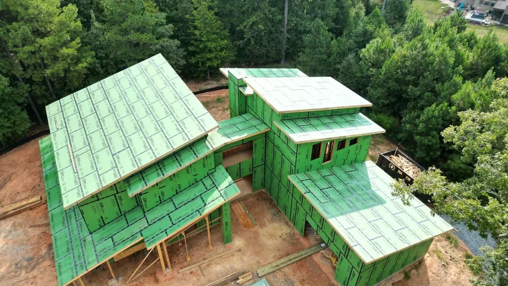 Modern home under construction showing structure and planning