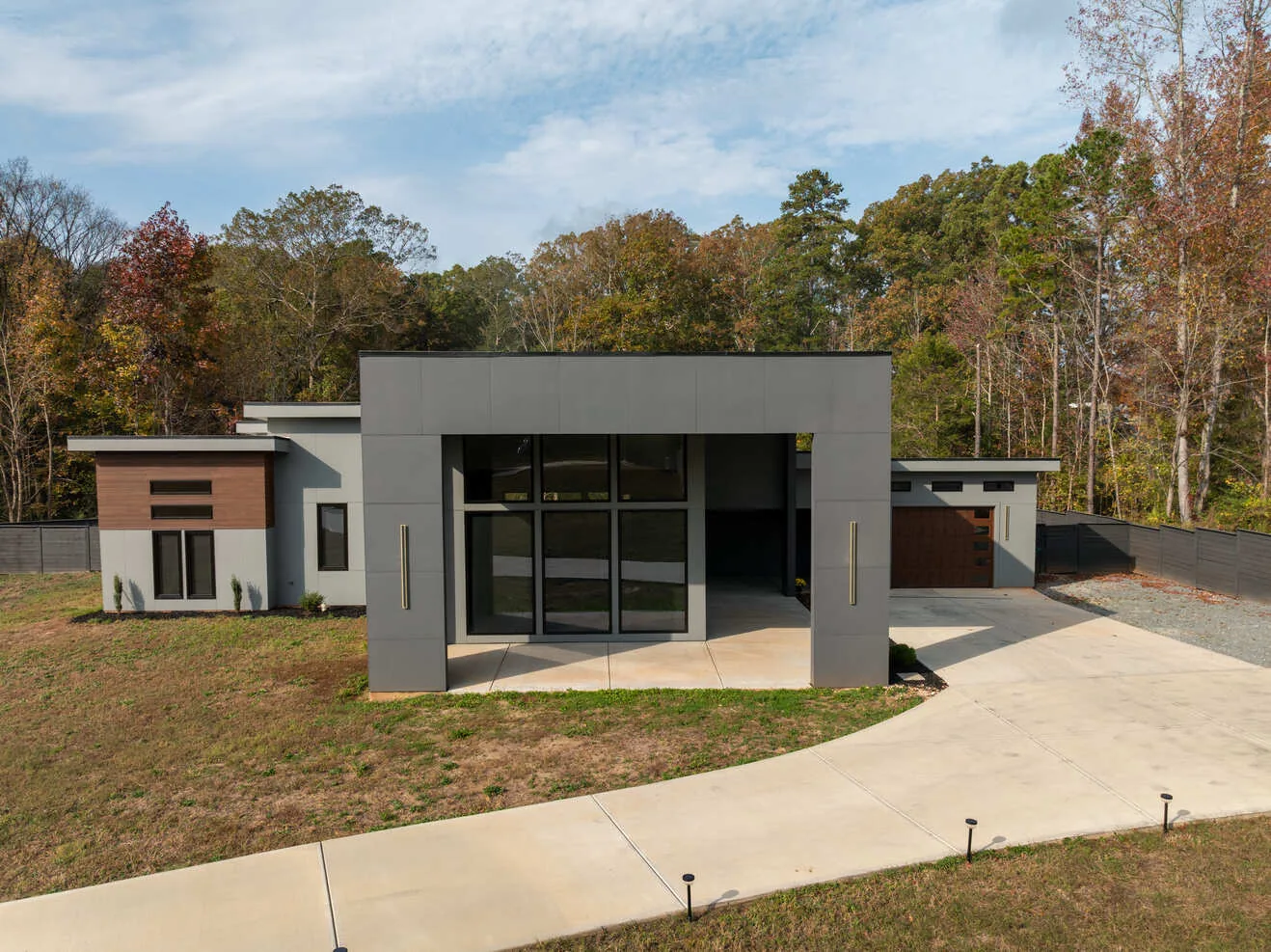 Modern home in Charlotte, NC with clean architectural lines and a covered entry