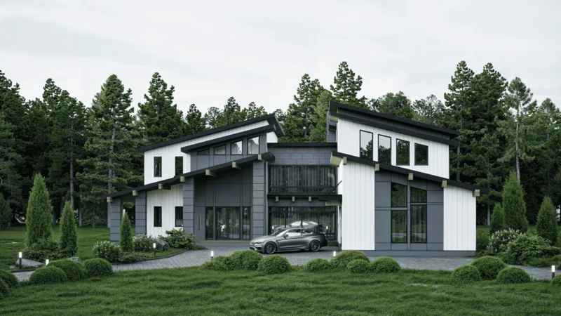 Modern home exterior with clean rooflines beside a forest